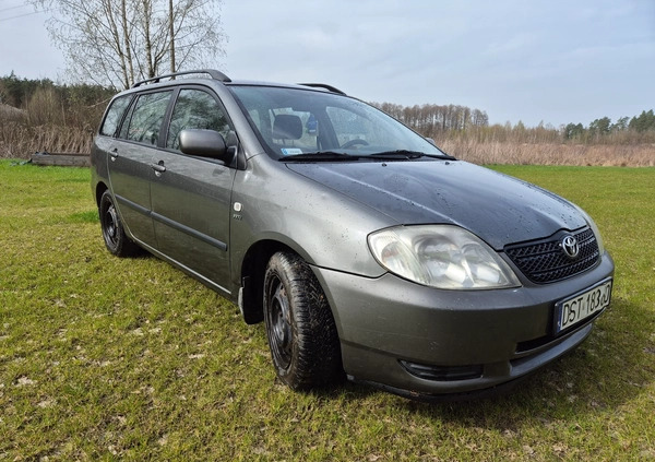 Toyota Corolla cena 7500 przebieg: 311000, rok produkcji 2003 z Strzelce Opolskie małe 121